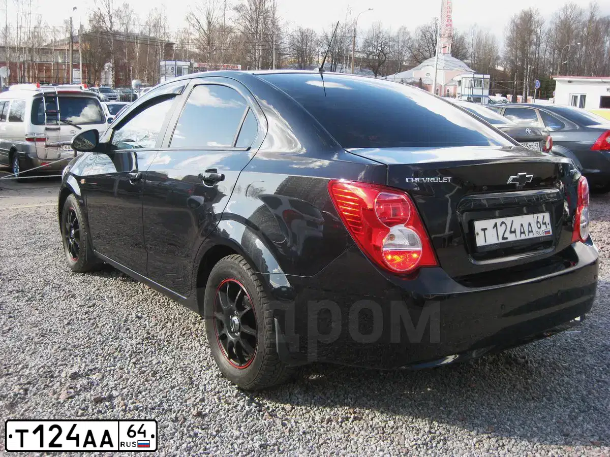 Фото автомобиля CHEVROLET AVEO, 2012 — госномер О438ВК198. Цвет: ЧЕРНЫЙ