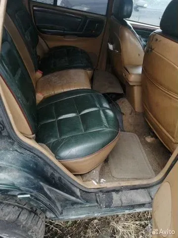 Фото автомобиля JEEP GRAND CHEROKEE, 1996 — госномер Х999ЕВ89. Цвет: ЗЕЛЕНЫЙ