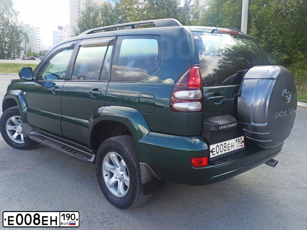 Фото автомобиля TOYOTA LANDCRUISER, 2004 — госномер Е008ЕН190. Цвет: ЗЕЛЕНЫЙ ТЕМНЫЙ