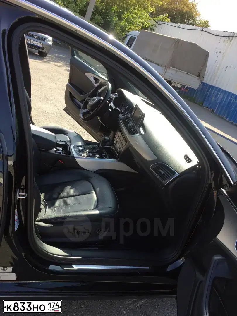 Фото автомобиля LADA 1117 KALINA, 2011 — госномер К833НО174. Цвет: СЕРЫЙ