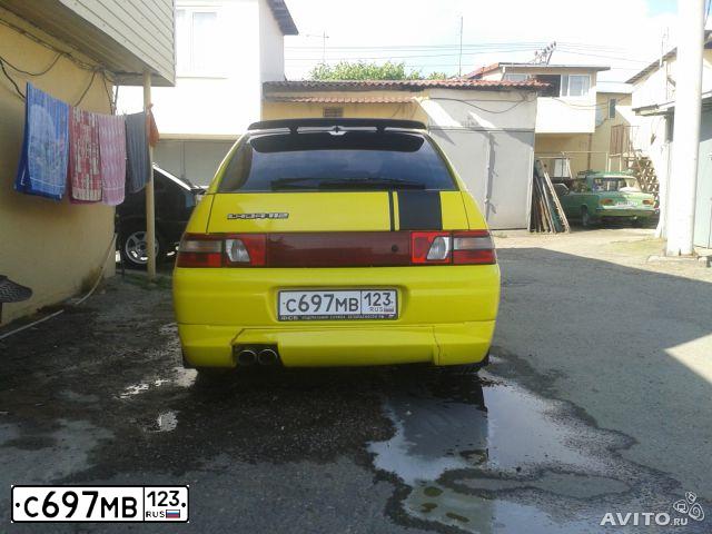 Фото автомобиля LADA 2112, 2007 — госномер А485УУ51. Цвет: ЖЕЛТО-ЧЕРНЫЙ