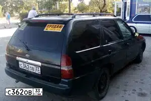 Фото автомобиля FORD ESCORT, 1996 — госномер О381СО33. Цвет: Темно-зеленый
