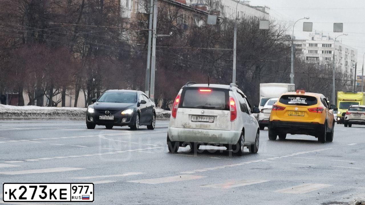 Фото автомобиля BMW X1, 2012 — госномер К273КЕ977. Цвет: ЧЕРНЫЙ