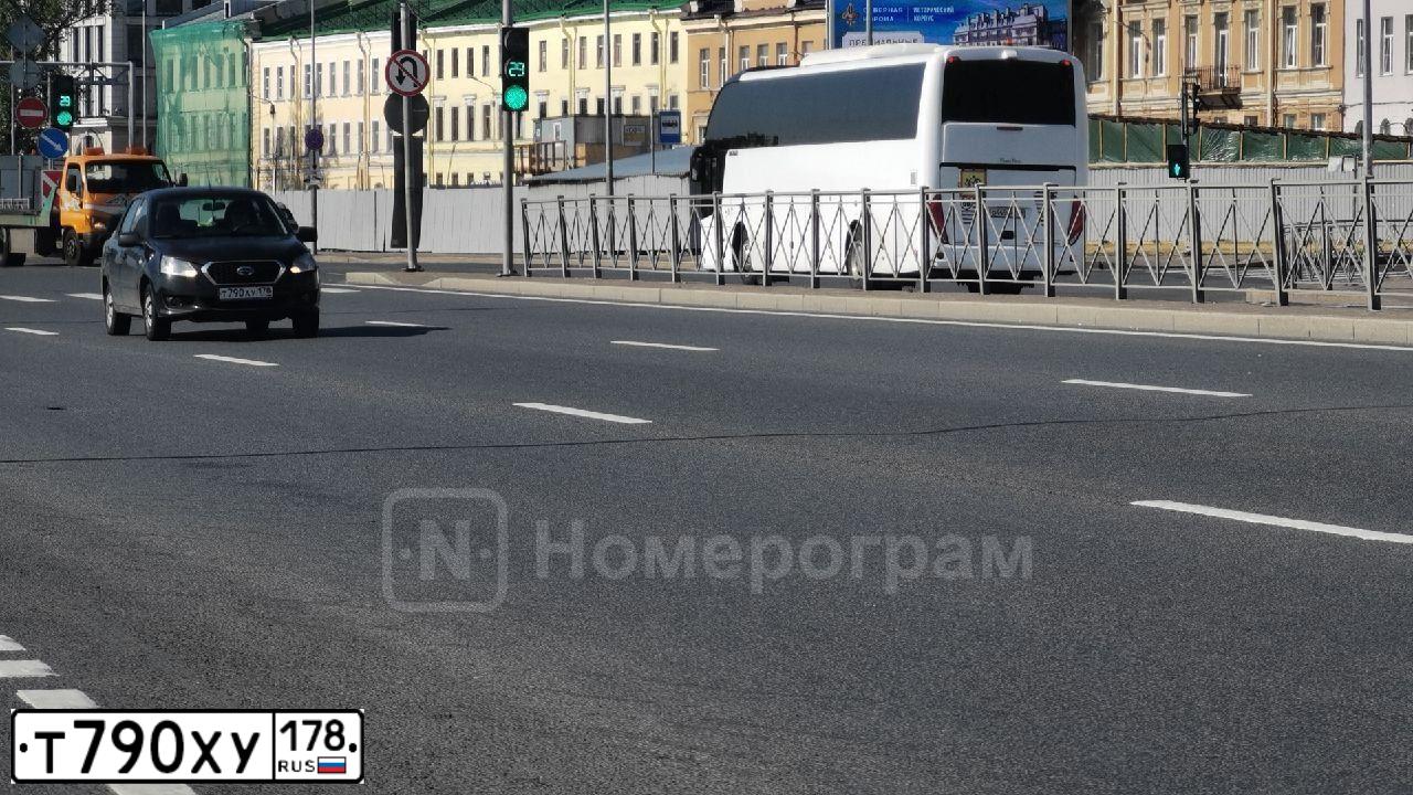 Фото автомобиля BMW X5, 2011 — госномер Т009РХ99. Цвет: ЧЕРНЫЙ