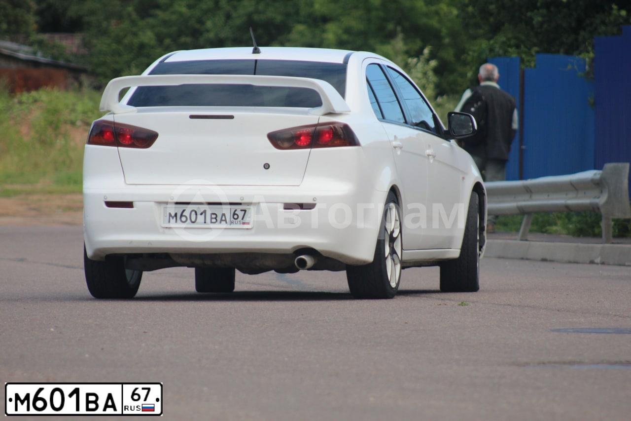 Фото автомобиля MITSUBISHI LANCER, 2007 — госномер М601ВА67. Цвет: Белый