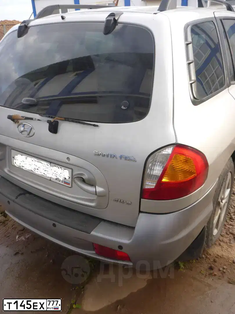 Фото автомобиля HYUNDAI SONATA, 2008 — госномер Т145ЕХ777. Цвет: ЧЕРНЫЙ