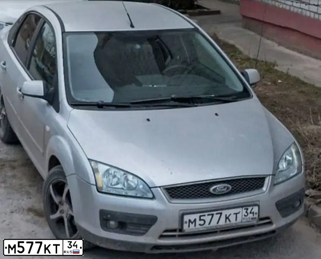 Фото автомобиля FORD FOCUS, 2005 — госномер О717АВ177. Цвет: СЕРЕБРИСТЫЙ