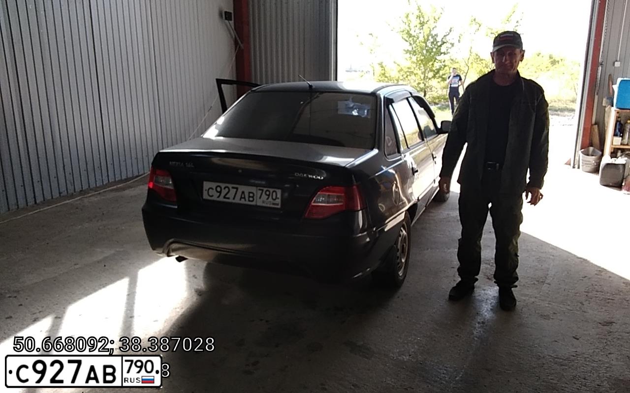 Фото автомобиля DAEWOO NEXIA, 2012 — госномер Х226КС31. Цвет: Бледно-Черный
