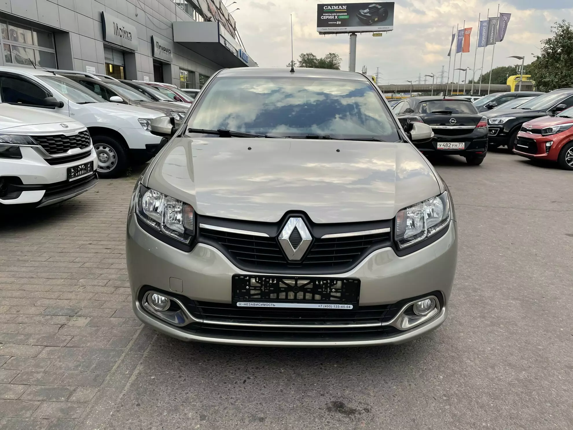 Фото автомобиля RENAULT LOGAN, 2018 — госномер А933УР799. Цвет: БЕЖЕВЫЙ