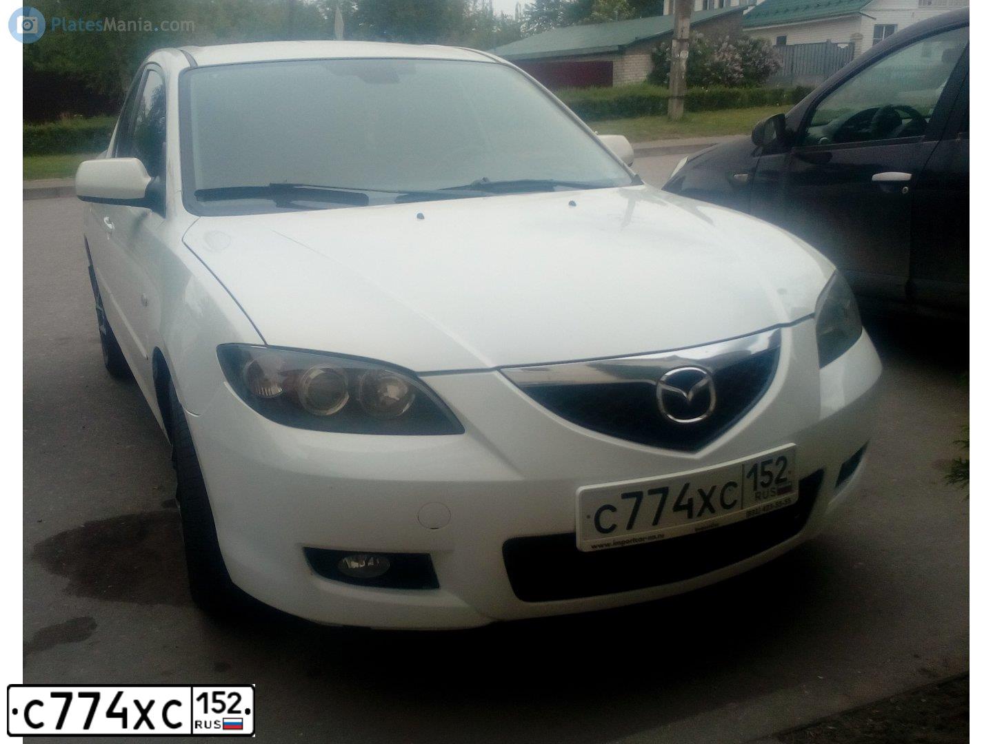 Фото автомобиля MAZDA 3, 2008 — госномер Е752УК62. Цвет: Белый