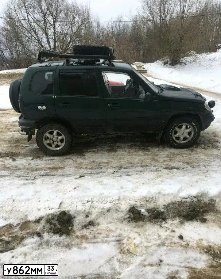 Фото автомобиля CHEVROLET NIVA, 2004 — госномер А491ТЕ33. Цвет: Темно-зеленый