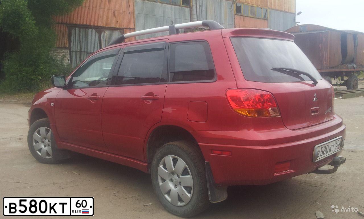 Фото автомобиля MITSUBISHI OUTLANDER, 2003 — госномер В580КТ60. Цвет: ВИШНЕВЫЙ