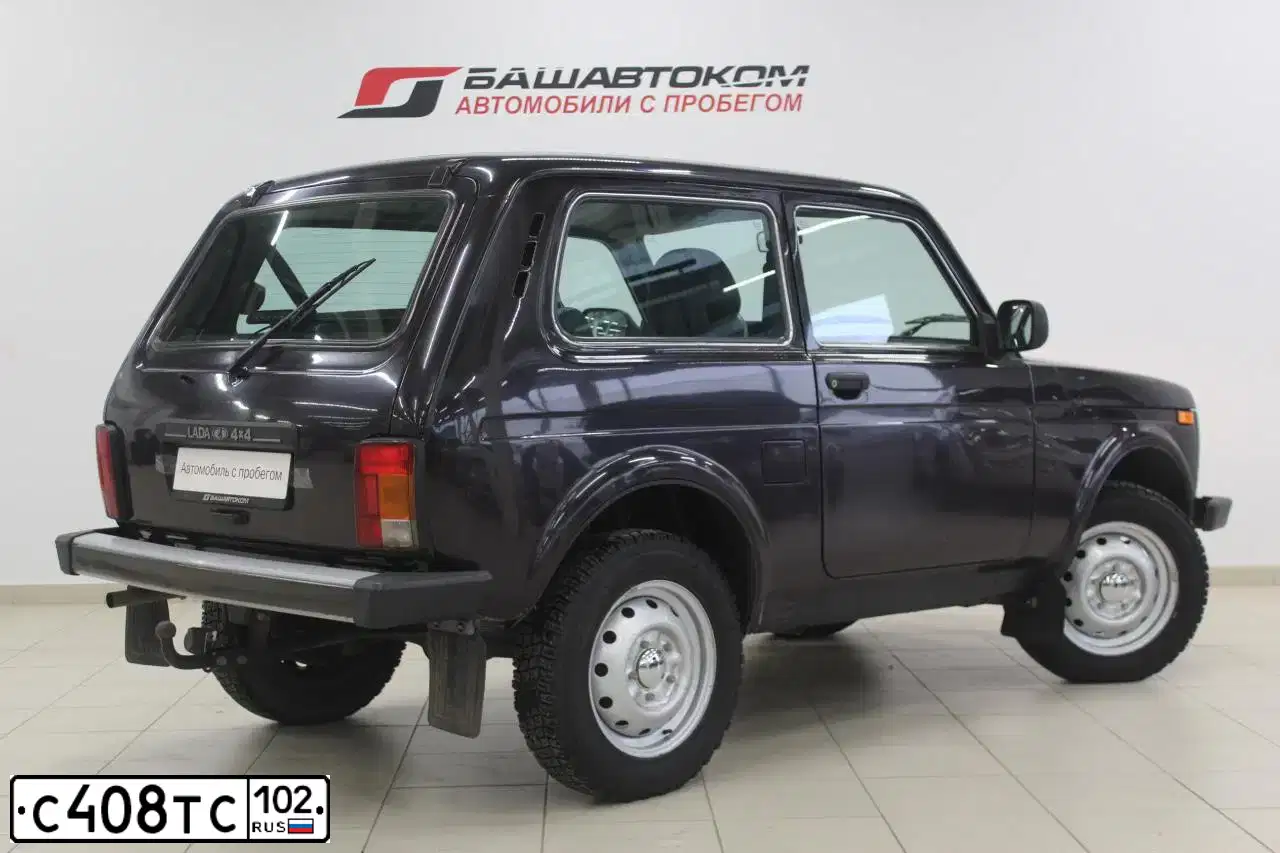 Фото автомобиля LADA 2121 NIVA, 2016 — госномер С408ТС102. Цвет: ТЕМНО-ФИОЛЕТОВЫЙ