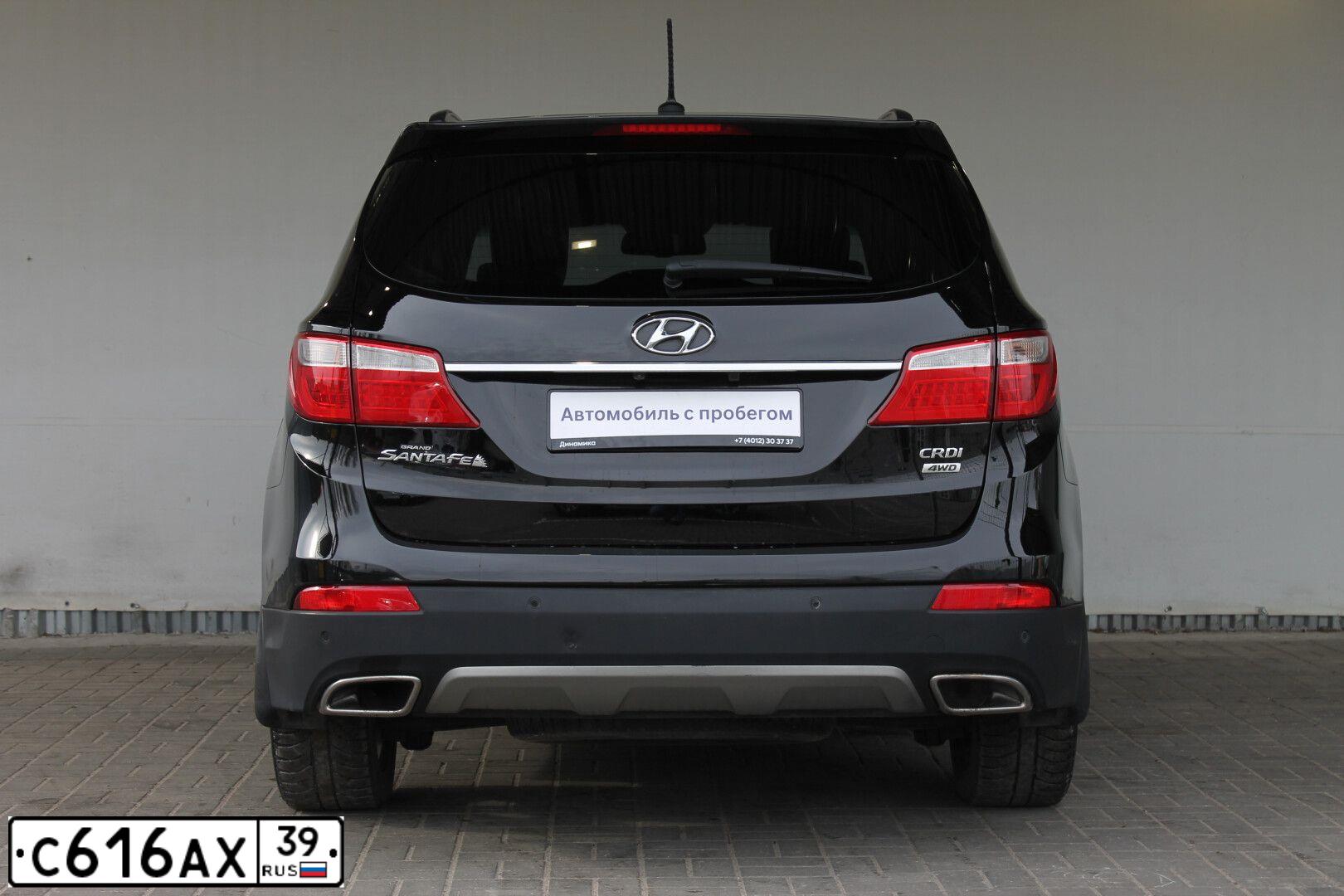 Фото автомобиля HYUNDAI GRAND SANTA FE, 2013 — госномер А504АА136. Цвет: ЧЕРНЫЙ