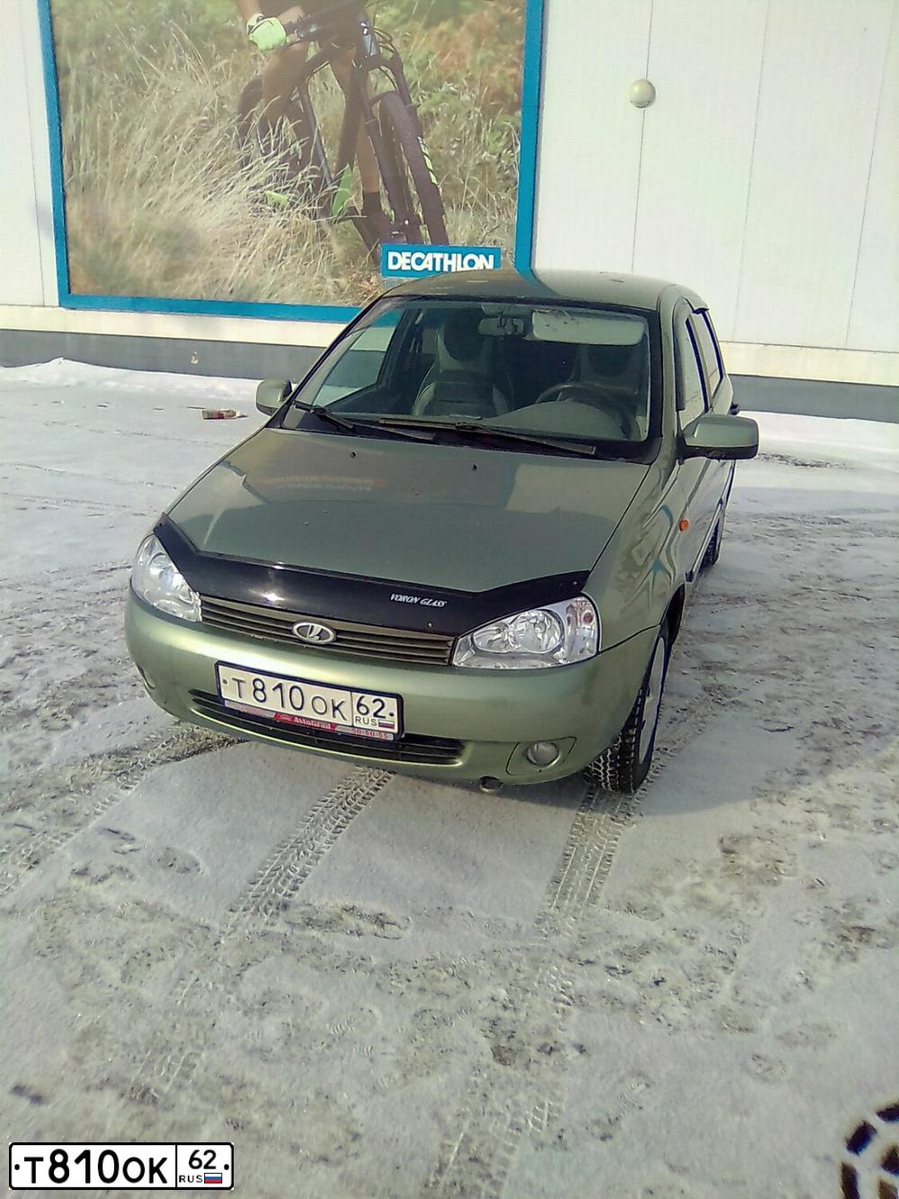 Фото автомобиля LADA 1119 KALINA, 2010 — госномер Т810ОК62. Цвет: СВЕТЛО-ЗЕЛЕНЫЙ
