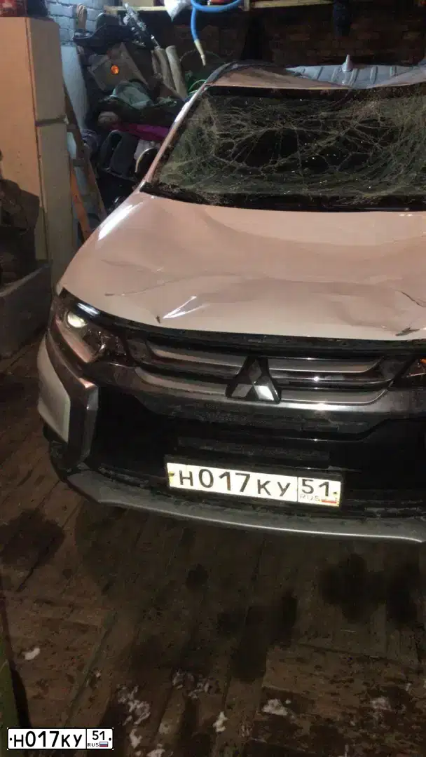 Фото автомобиля MITSUBISHI OUTLANDER, 2018 — госномер Н017КУ51. Цвет: Белый