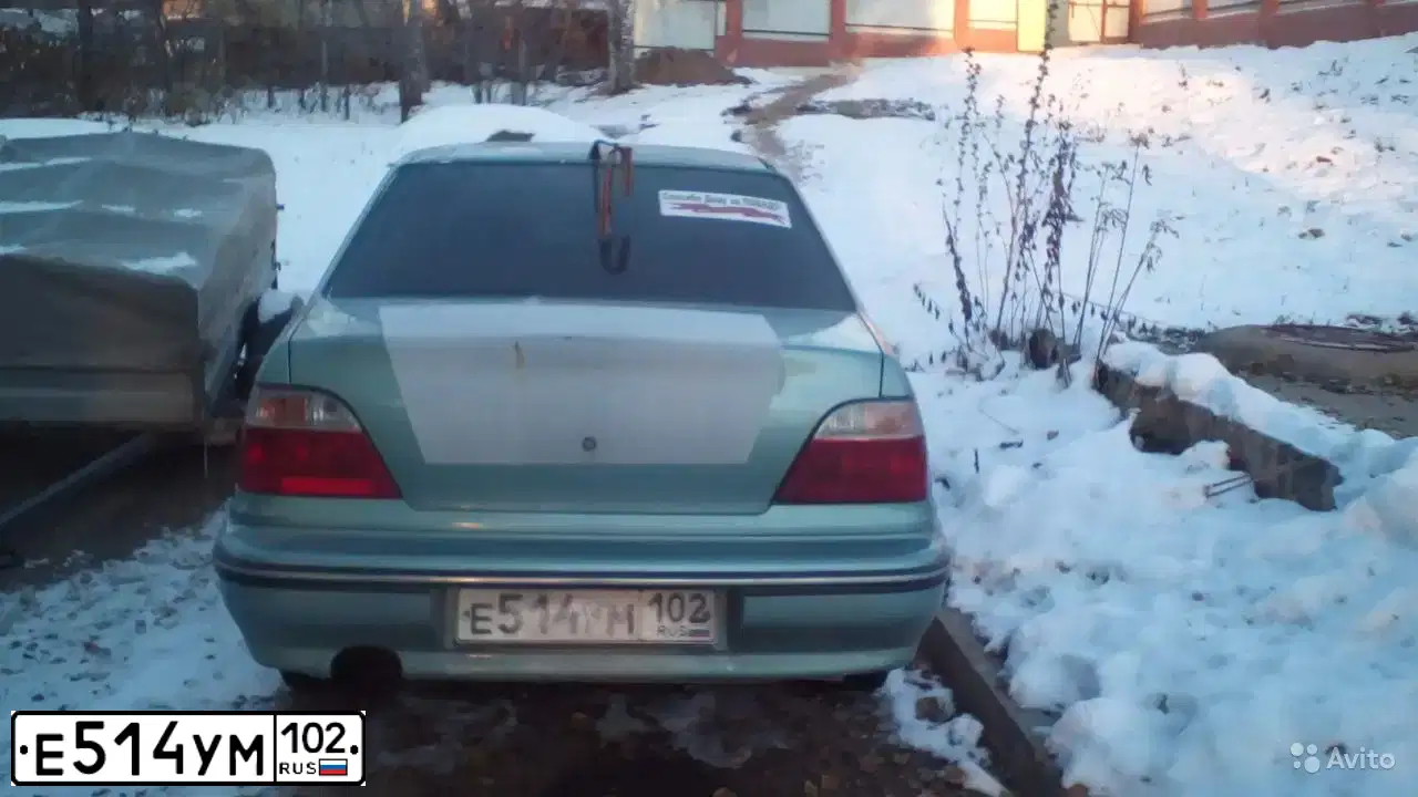 Фото автомобиля DAEWOO NEXIA, 2008 — госномер Е514УМ102. Цвет: ЗЕЛЕНАЯ ГЛАЗУРЬ