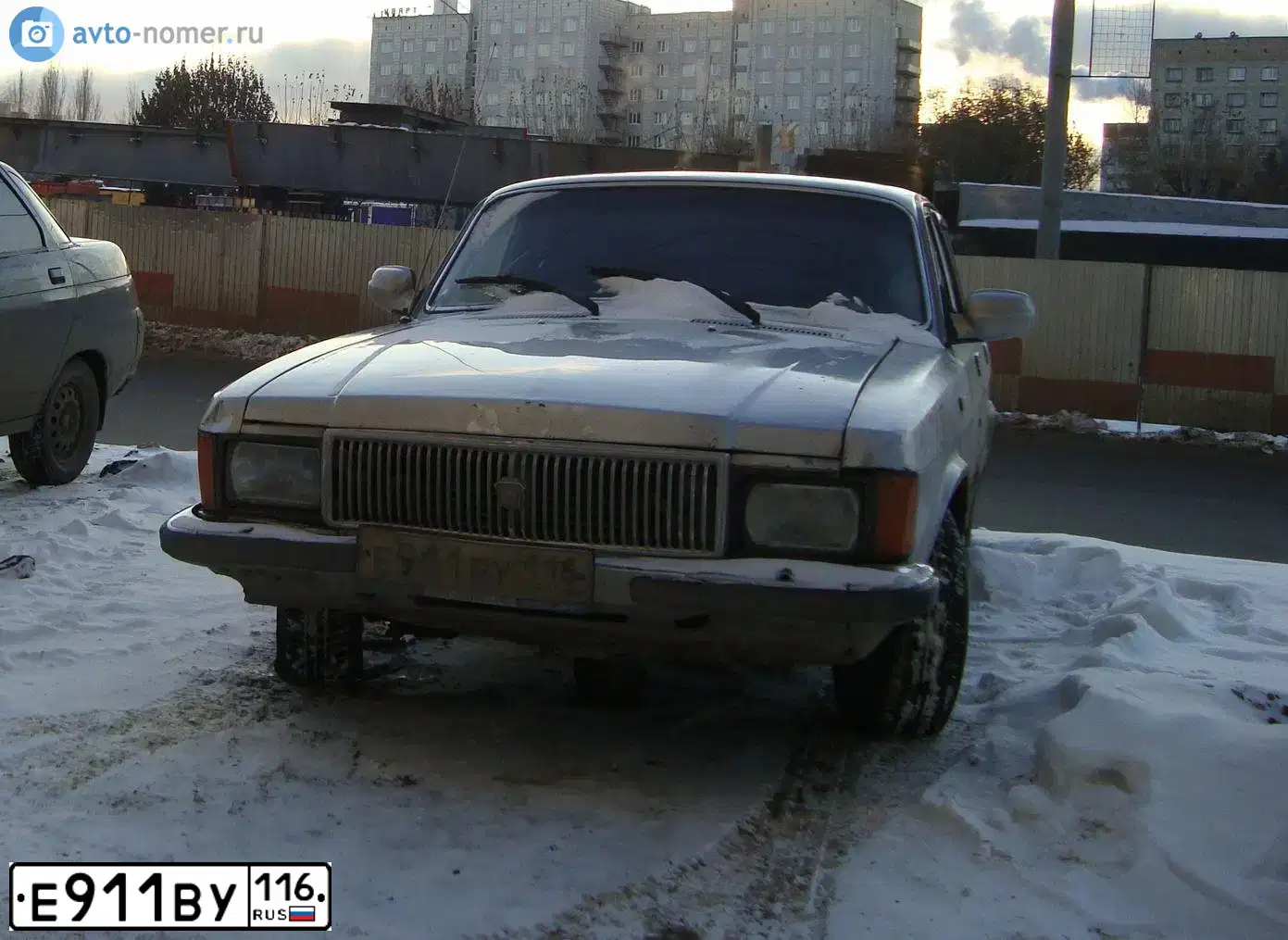 Фото автомобиля GAZ 3102 WOLGA, 1995 — госномер Е911ВУ116. Цвет: СЕРО-БЕЛЫЙ