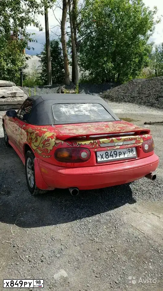 Фото автомобиля MAZDA MX-5, 1993 — госномер Х849РУ98. Цвет: Красный