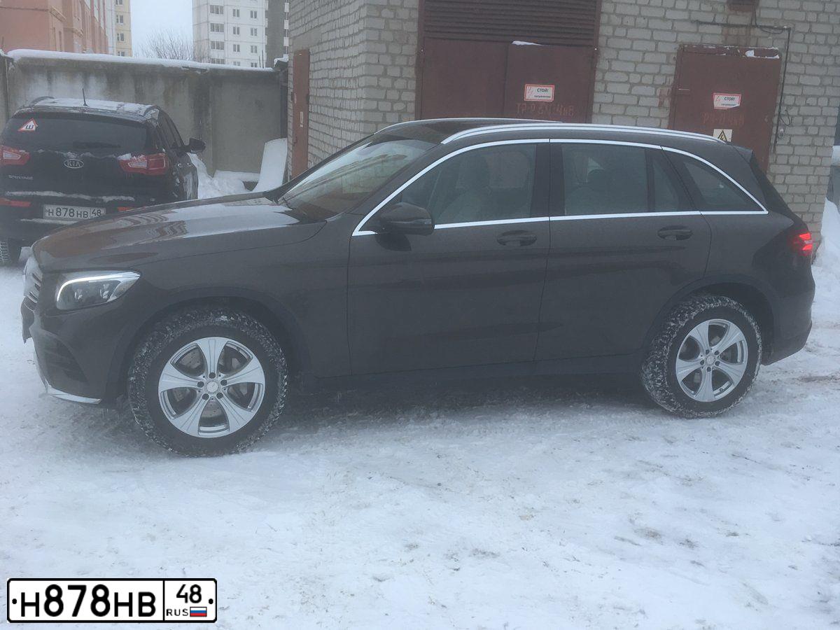 Фото автомобиля KIA SPORTAGE, 2011 — госномер О115ТУ62. Цвет: ЧЕРНЫЙ ПЕРЛАМУТР