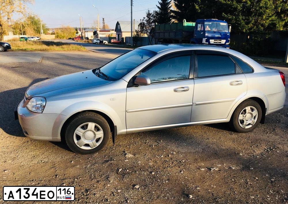 Фото автомобиля CHEVROLET LACETTI, 2007 — госномер А134ЕО116. Цвет: Серебристый