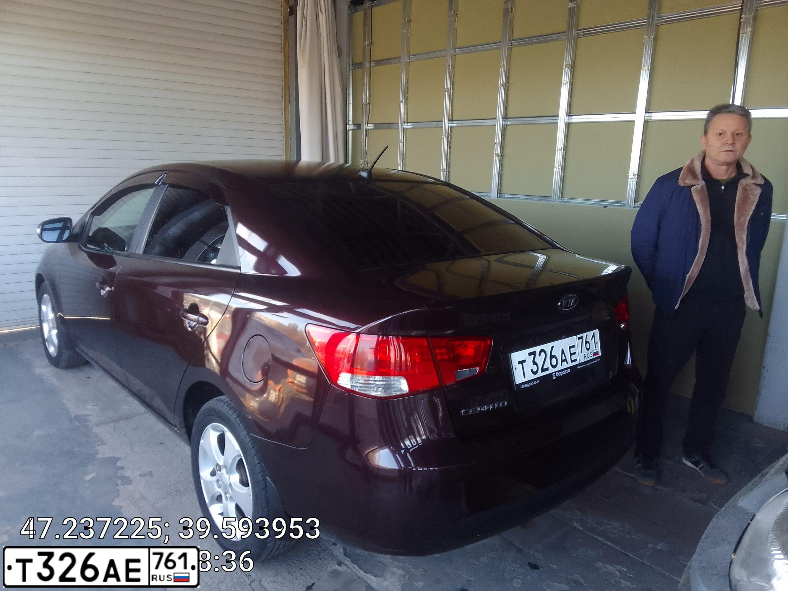 Фото автомобиля KIA CERATO, 2010 — госномер Т326АЕ761. Цвет: ВИШНЕВЫЙ ТЕМНЫЙ