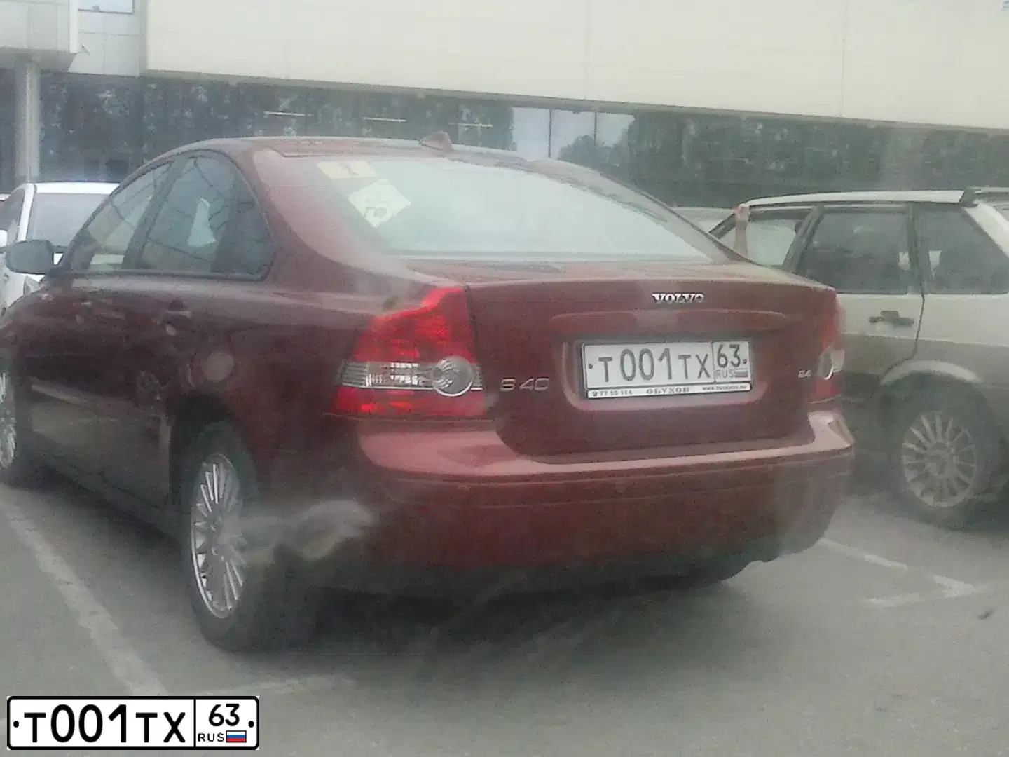 Фото автомобиля VOLVO S40, 2006 — госномер Т001ТХ63. Цвет: ТЕМНО-КРАСНЫЙ