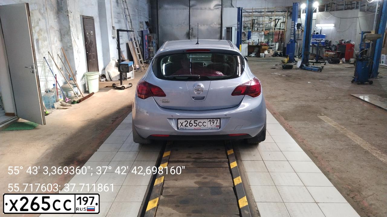 Фото автомобиля OPEL ASTRA, 2011 — госномер Х265СС197. Цвет: СЕРЫЙ