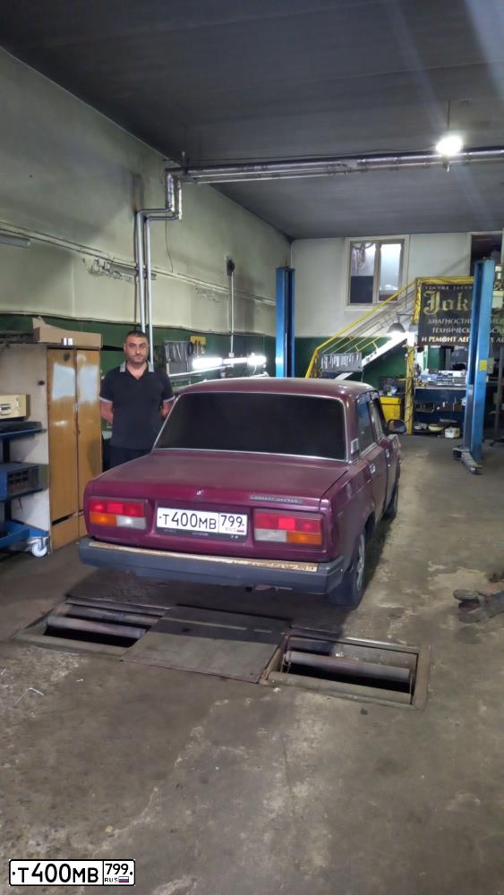Фото автомобиля LADA 2107, 2004 — госномер В687РТ90. Цвет: КРАСНЫЙ ТЕМНЫЙ