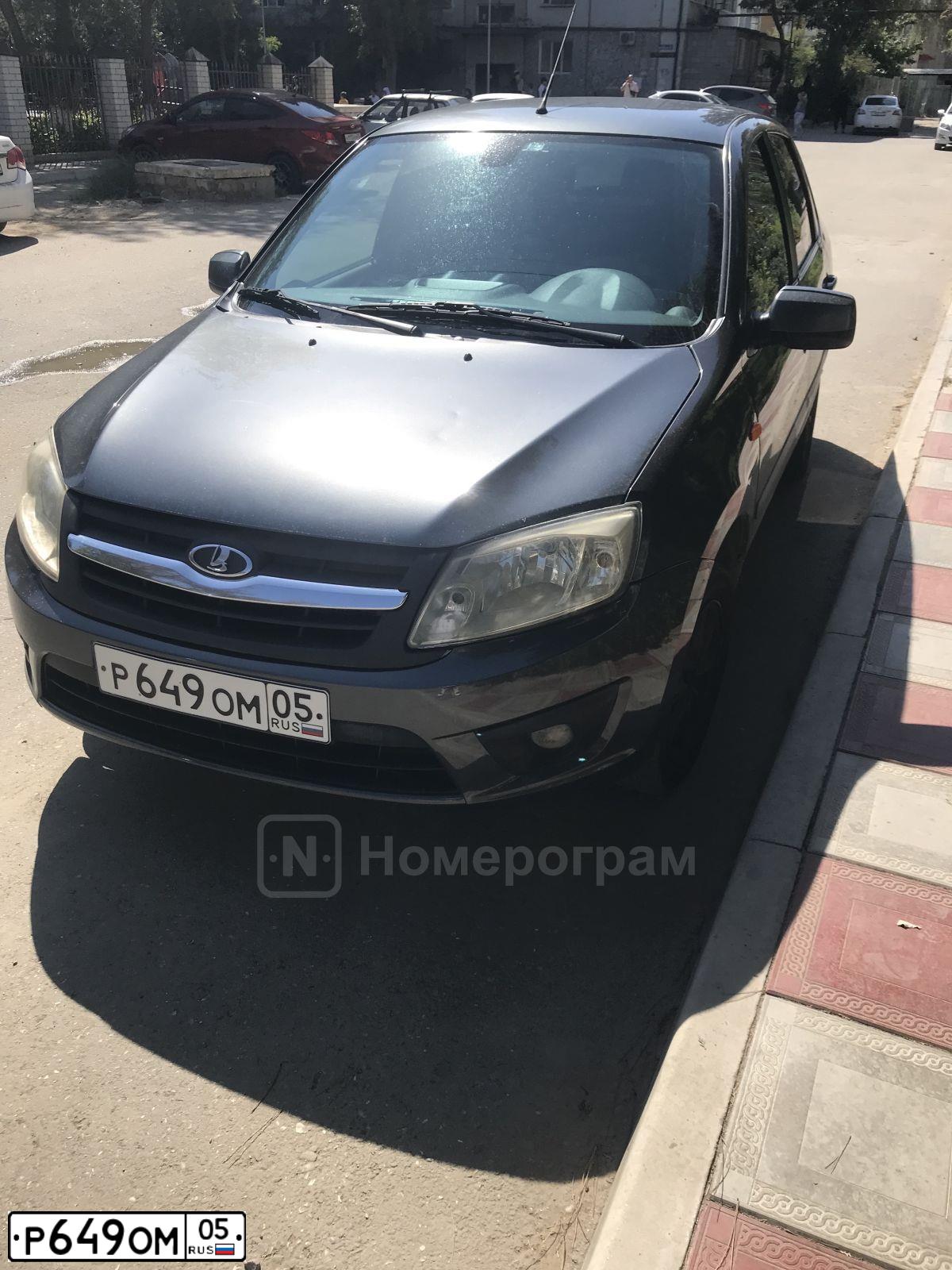 Фото автомобиля LADA 2190 GRANTA, 2014 — госномер Р649ОМ05. Цвет: ТЕМНО-СЕРЫЙ