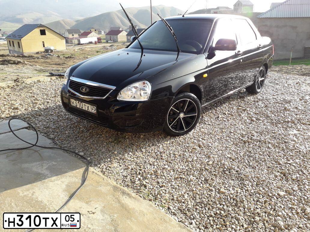 Фото автомобиля LADA 2170 PRIORA, 2015 — госномер Н310ТХ05. Цвет: ЧЕРНЫЙ