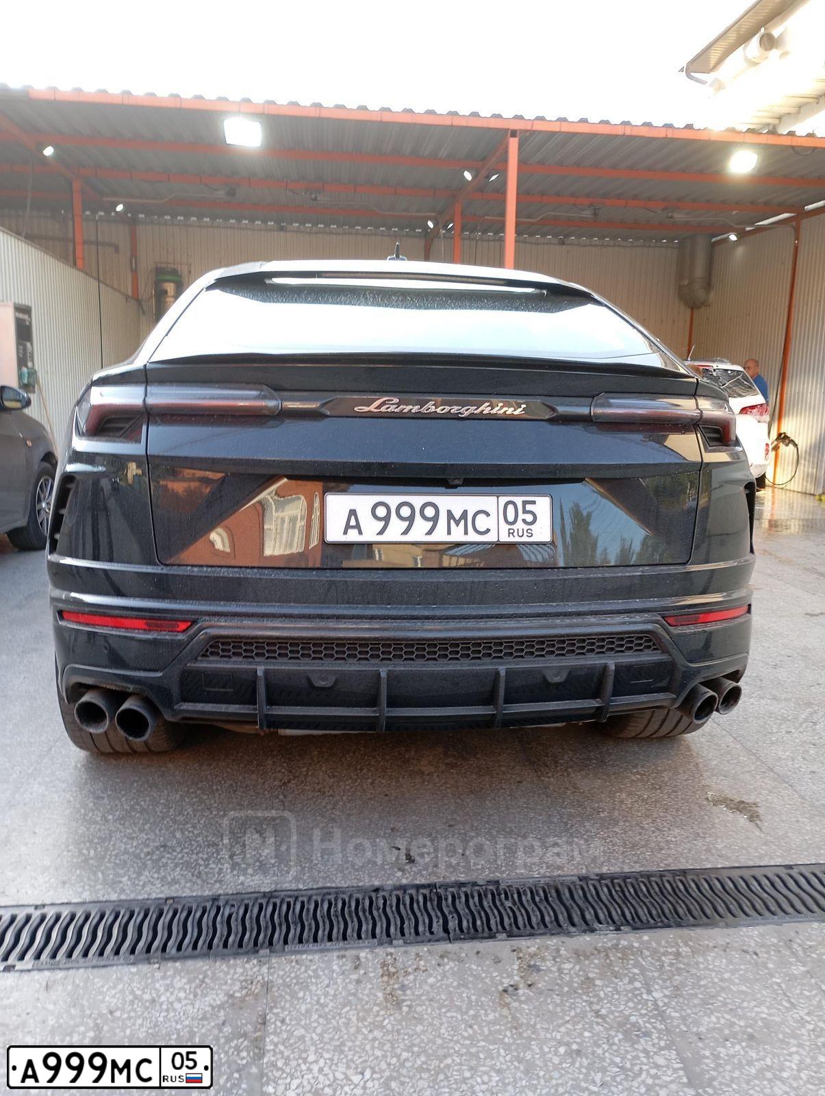 Фото автомобиля MERCEDES CLS-KLASSE, 2005 — госномер А999МС05. Цвет: ТЕМНО-КРАСНЫЙ