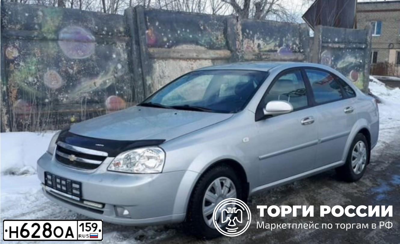 Фото автомобиля CHEVROLET LACETTI, 2007 — госномер Н628ОА159. Цвет: Серебристый