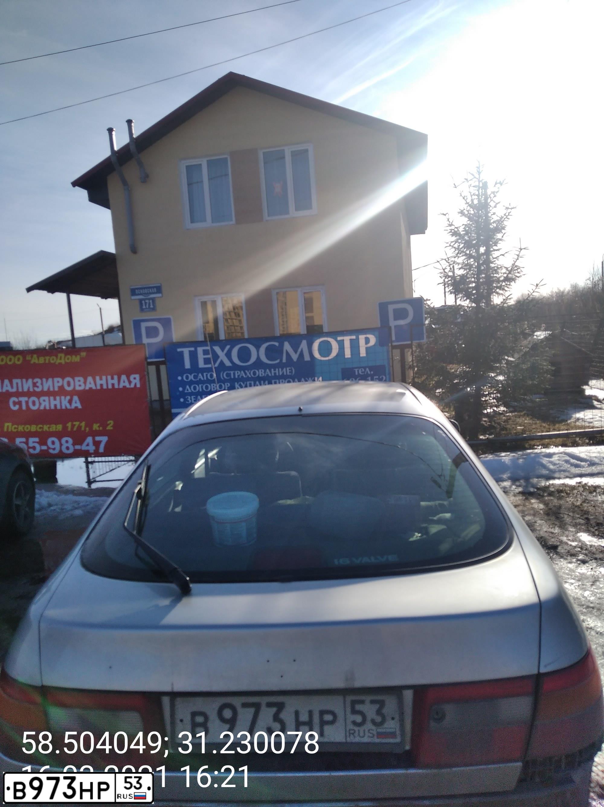 Фото автомобиля TOYOTA CARINA, 1998 — госномер В973НР53. Цвет: серебристый