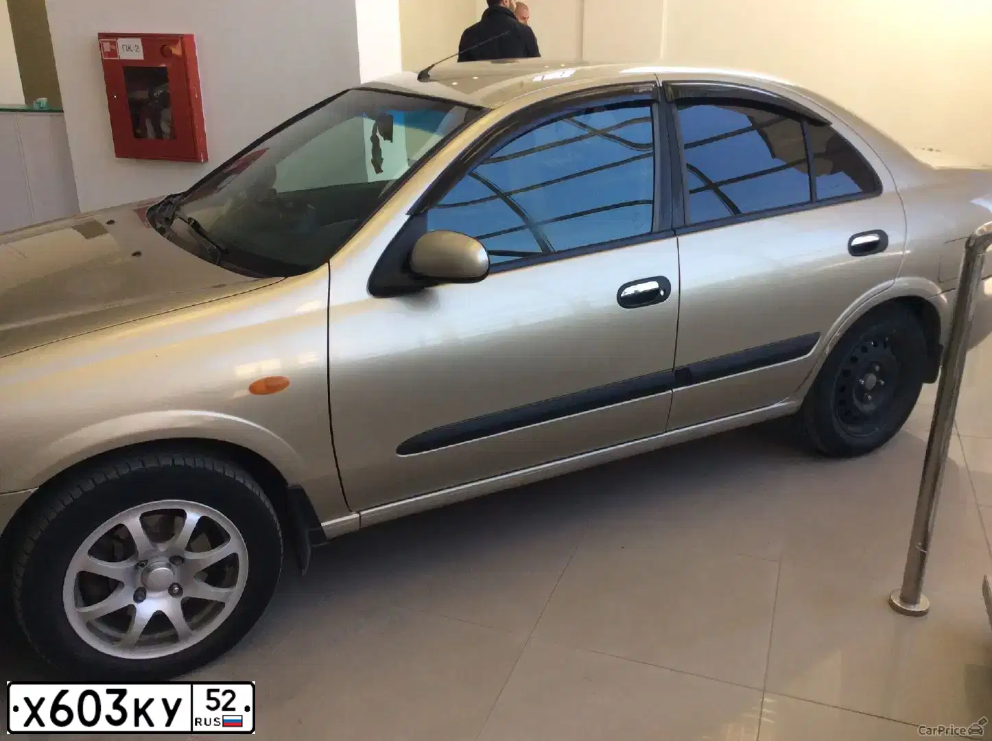 Фото автомобиля NISSAN ALMERA, 2003 — госномер О005ЕК44. Цвет: ЗОЛОТИСТЫЙ
