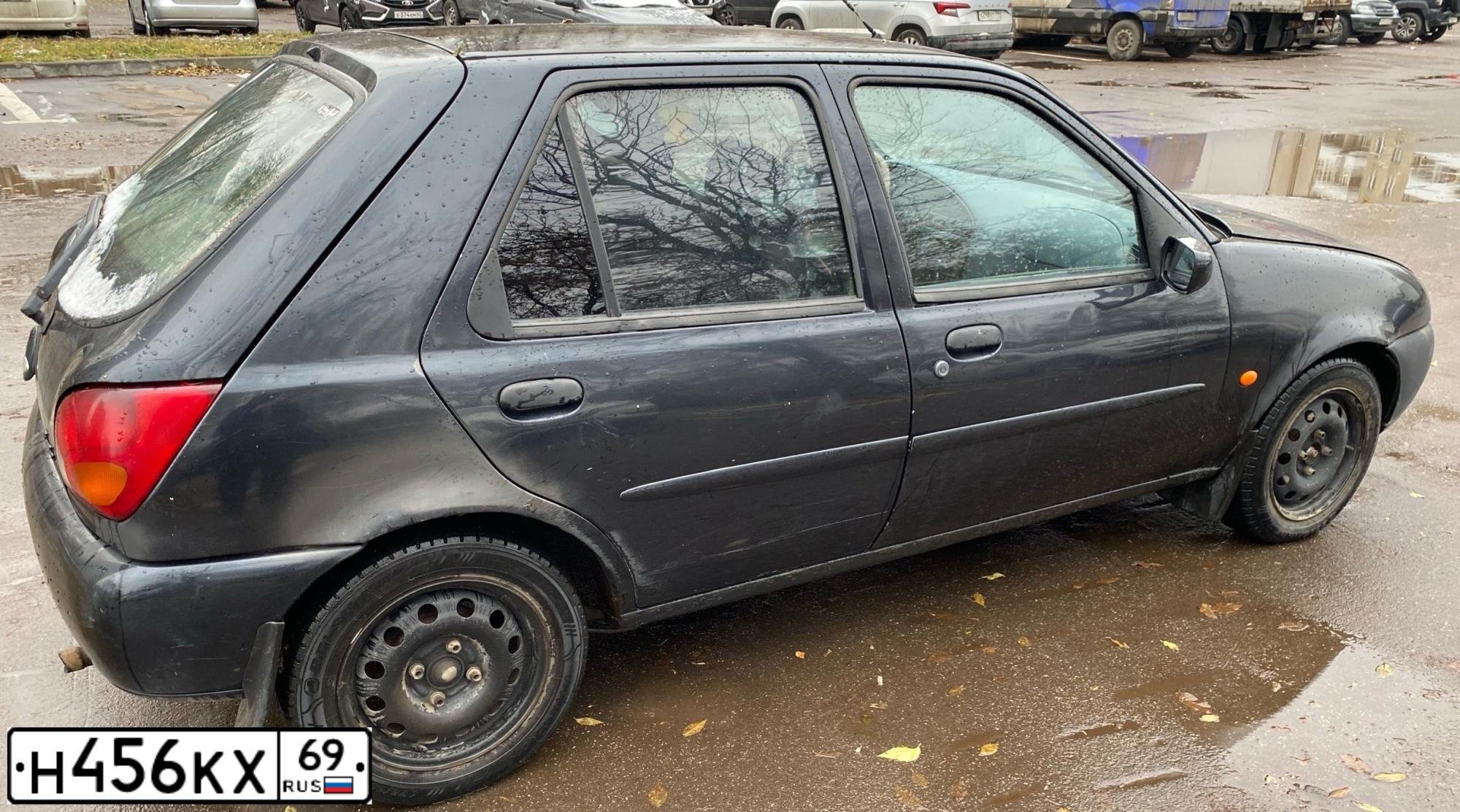 Фото автомобиля FORD FIESTA / ASPIRE, 1997 — госномер Х993УА78. Цвет: ЧЕРНЫЙ