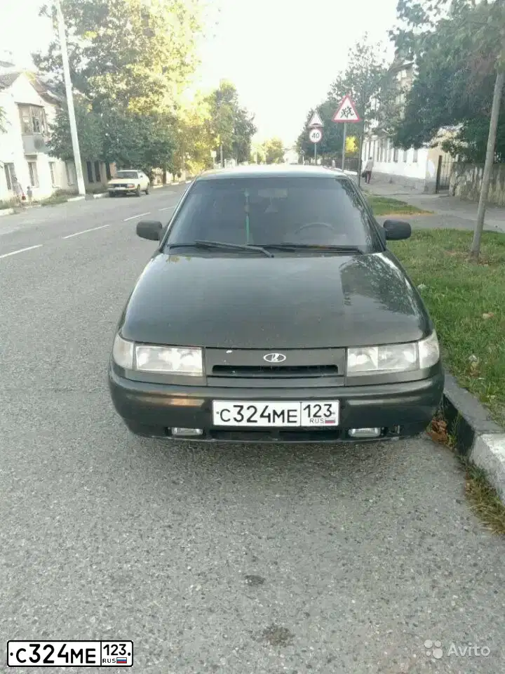 Фото автомобиля LADA 2110 LADA, 2004 — госномер М939НВ82. Цвет: ЗОЛОТИСТО ТЕМНО-ЗЕЛЕНЫЙ