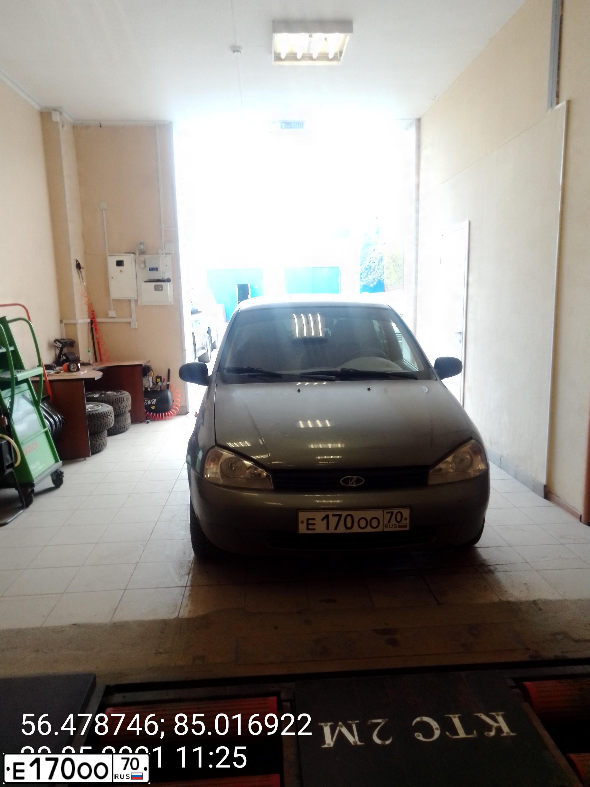 Фото автомобиля LADA 1119 KALINA, 2007 — госномер Н380ВС70. Цвет: СЕРЫЙ
