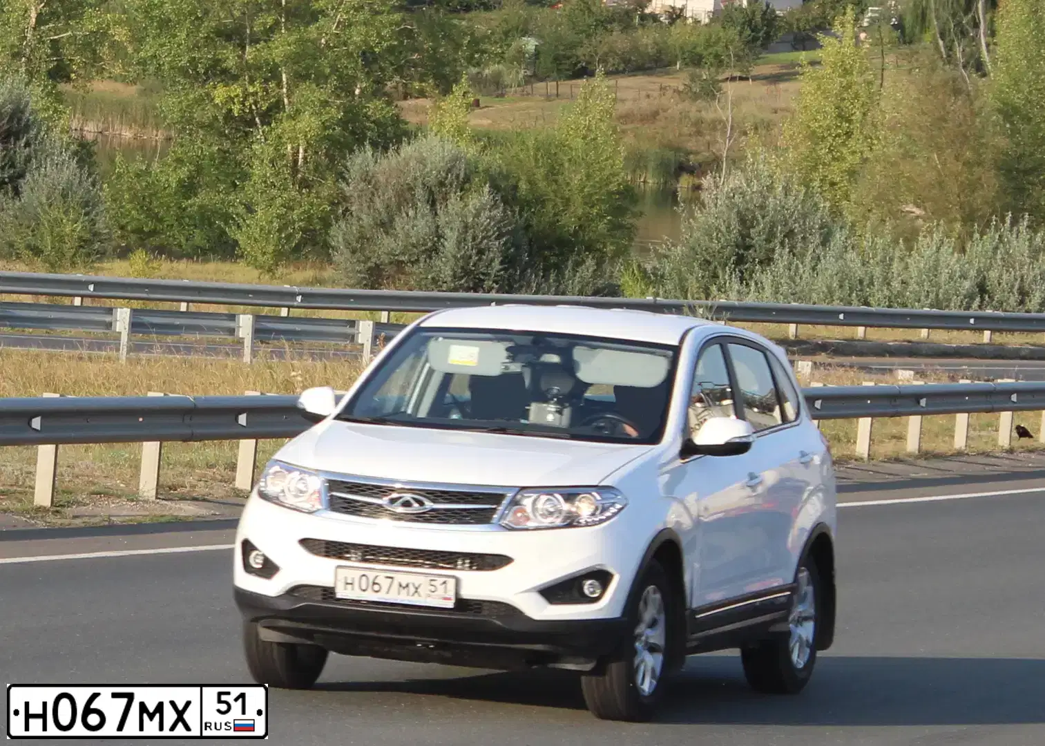 Фото автомобиля CHERY T21, 2015 — госномер Н067МХ51. Цвет: БЕЛЫЙ