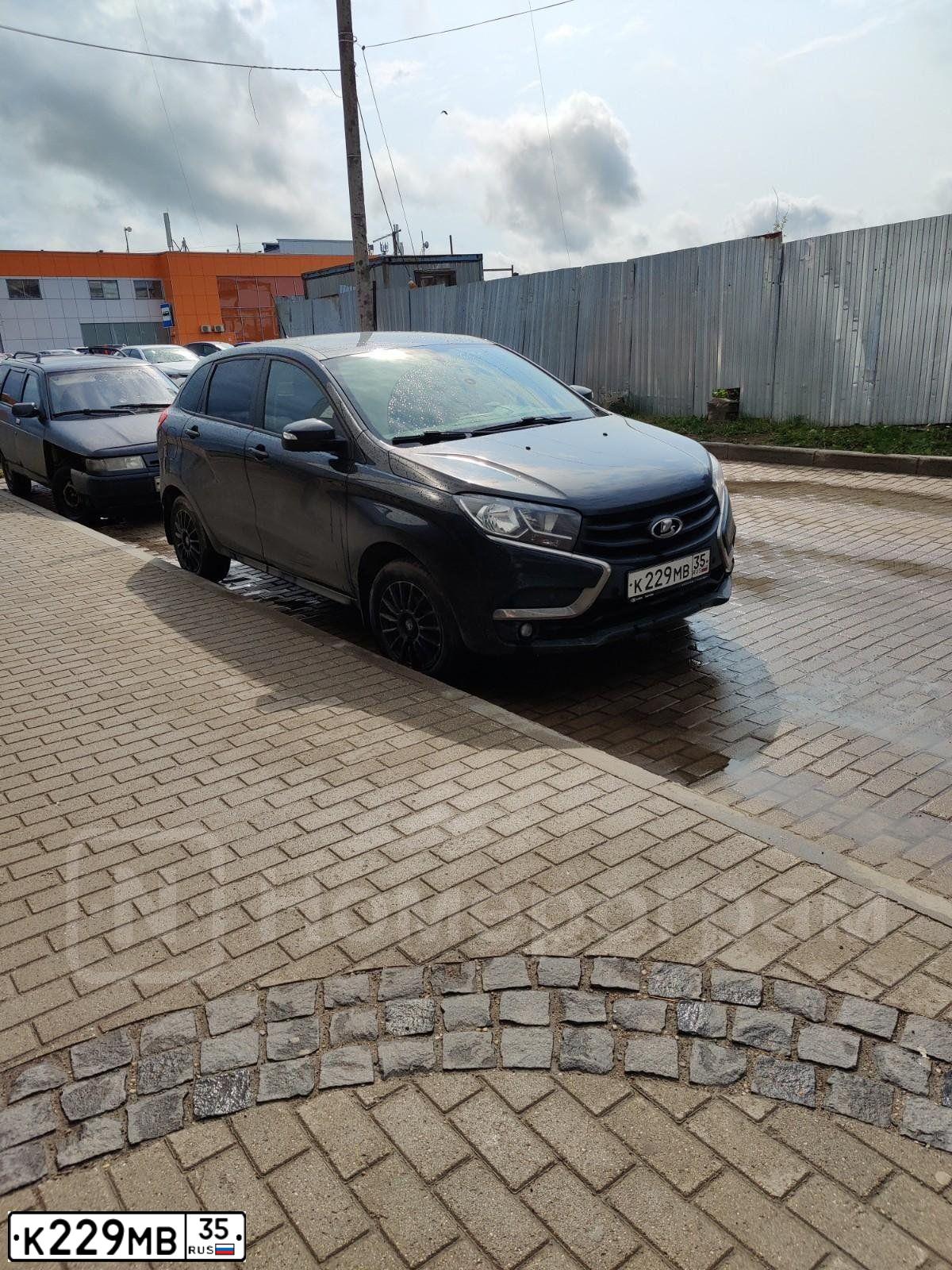Фото автомобиля LADA XRAY, 2019 — госномер К229МВ35. Цвет: ЧЕРНЫЙ