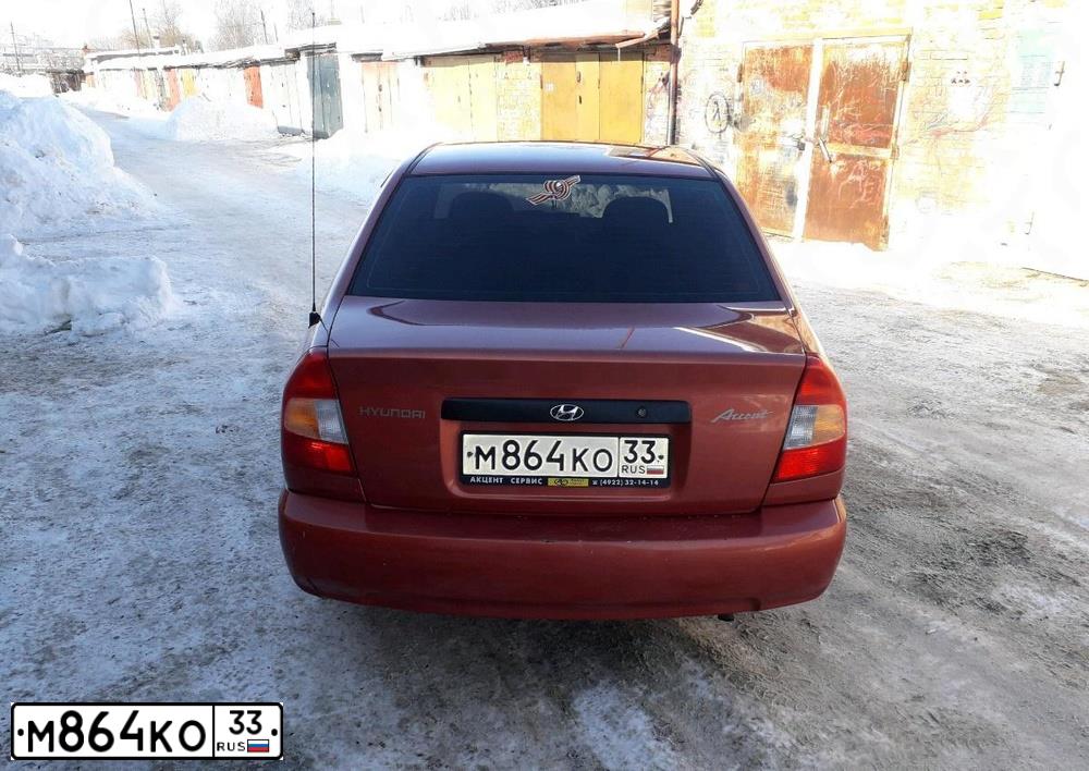 Фото автомобиля TAGAZ ACCENT, 2008 — госномер М864КО33. Цвет: ОРАНЖЕВЫЙ