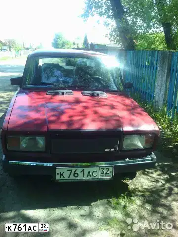 Фото автомобиля LADA 2107, 1994 — госномер К761АС32. Цвет: КРАСНЫЙ