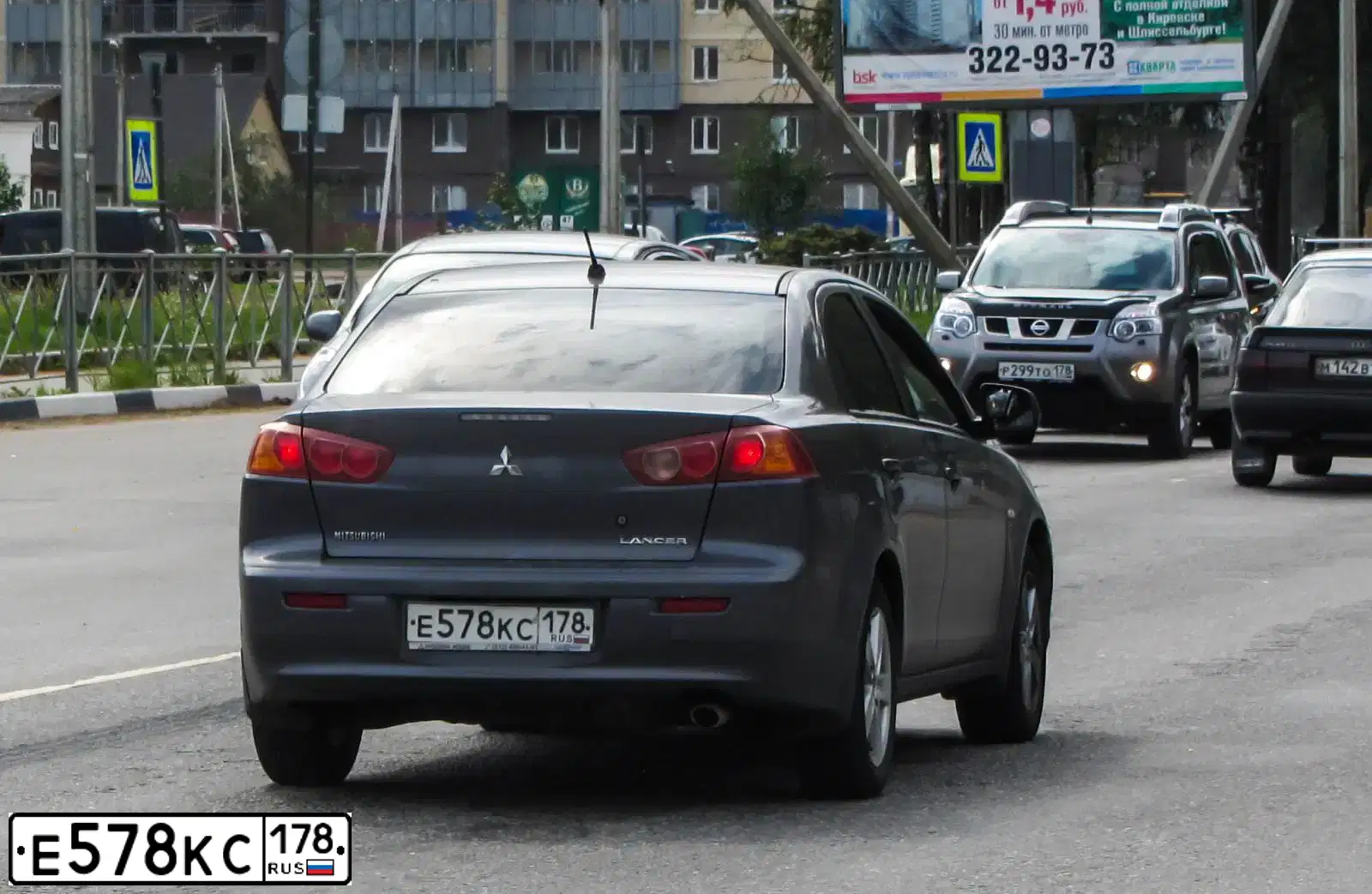 Фото автомобиля MITSUBISHI LANCER, 2007 — госномер Е578КС178. Цвет: СЕРЫЙ
