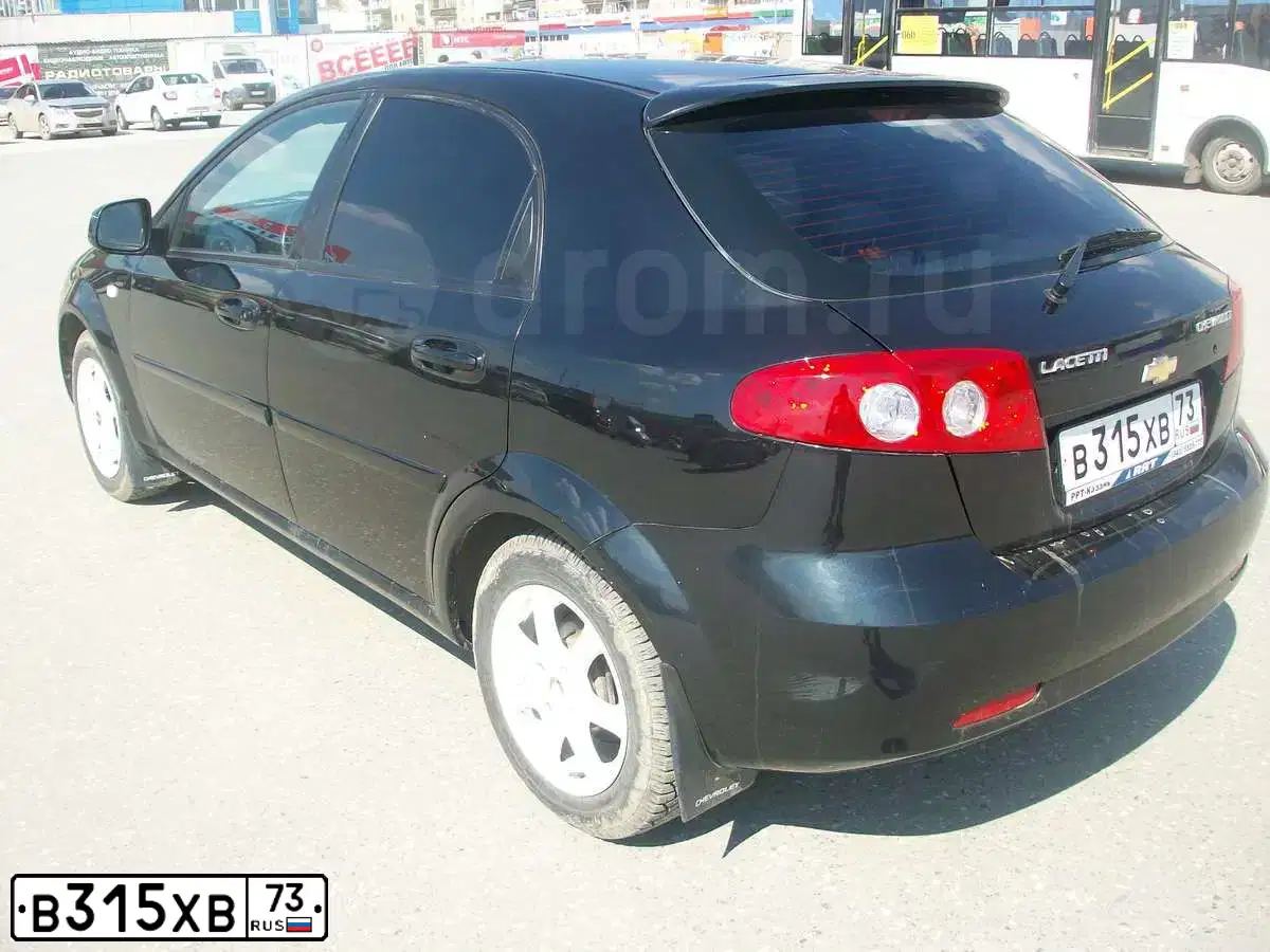 Фото автомобиля CHEVROLET T LACETTI, 2010 — госномер М595ЕН196. Цвет: ЧЕРНЫЙ