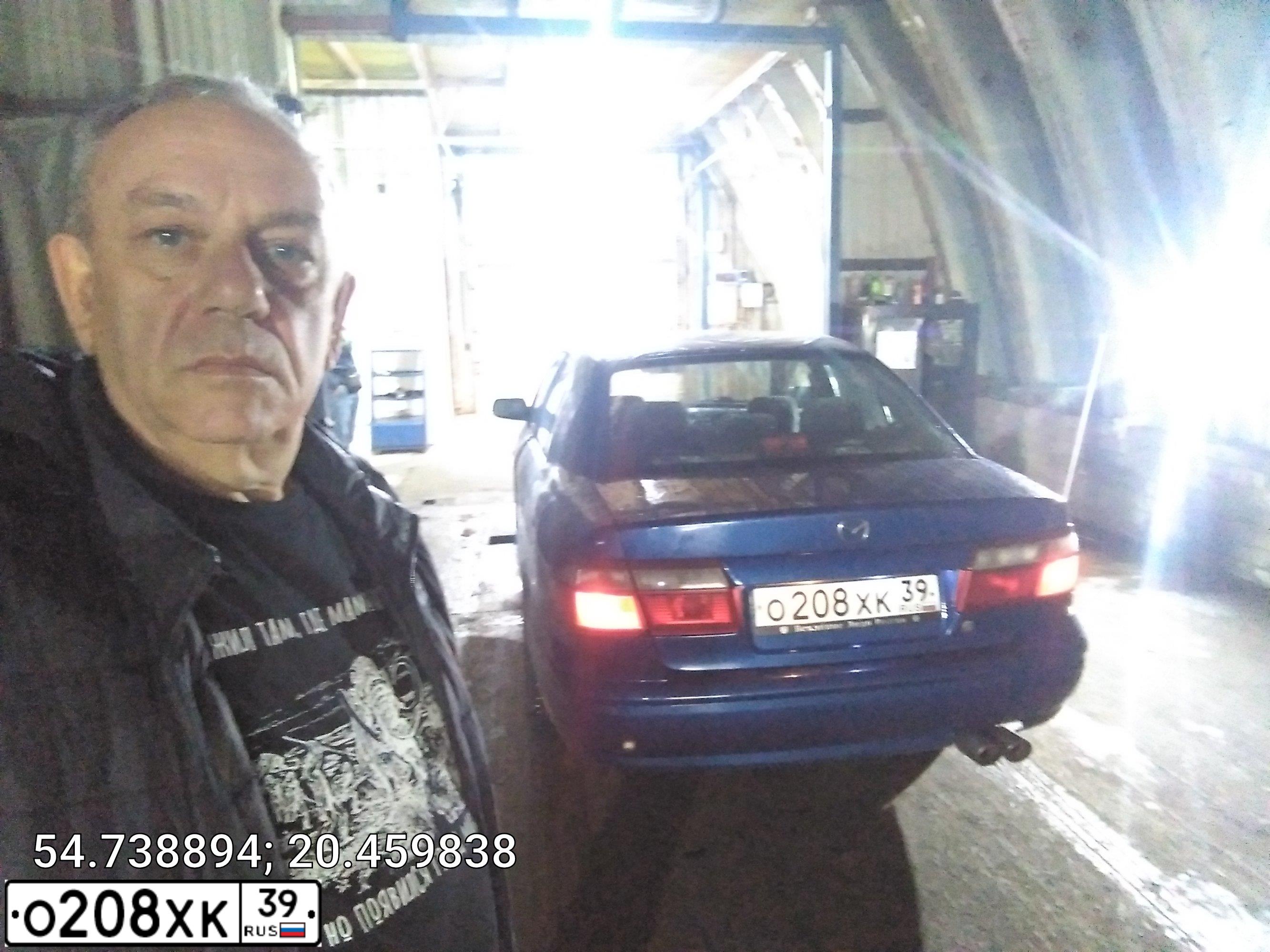 Фото автомобиля MAZDA 626, 1999 — госномер Т634НМ39. Цвет: синий