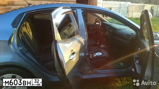 Фото автомобиля KIA RIO, 2011 — госномер М603ВН32. Цвет: ГОЛУБОЙ