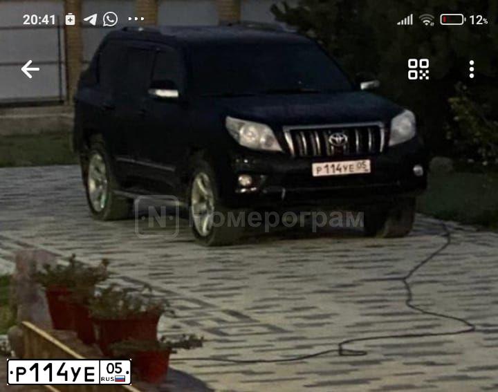 Фото автомобиля TOYOTA LANDCRUISER, 2010 — госномер Р114УЕ05. Цвет: ЧЕРНЫЙ