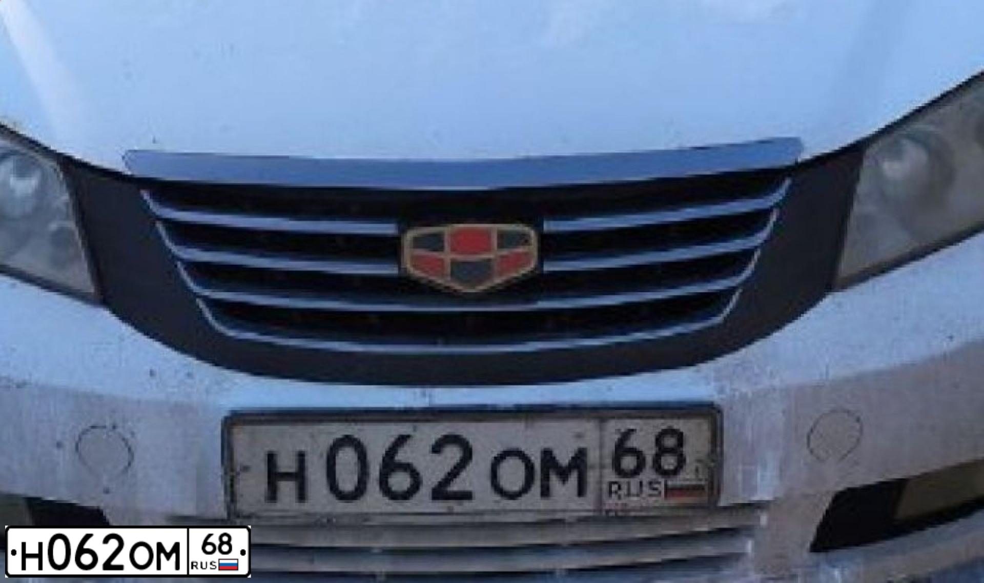 Фото автомобиля GEELY EMGRAND, 2013 — госномер Н062ОМ68. Цвет: БЕЛЫЙ