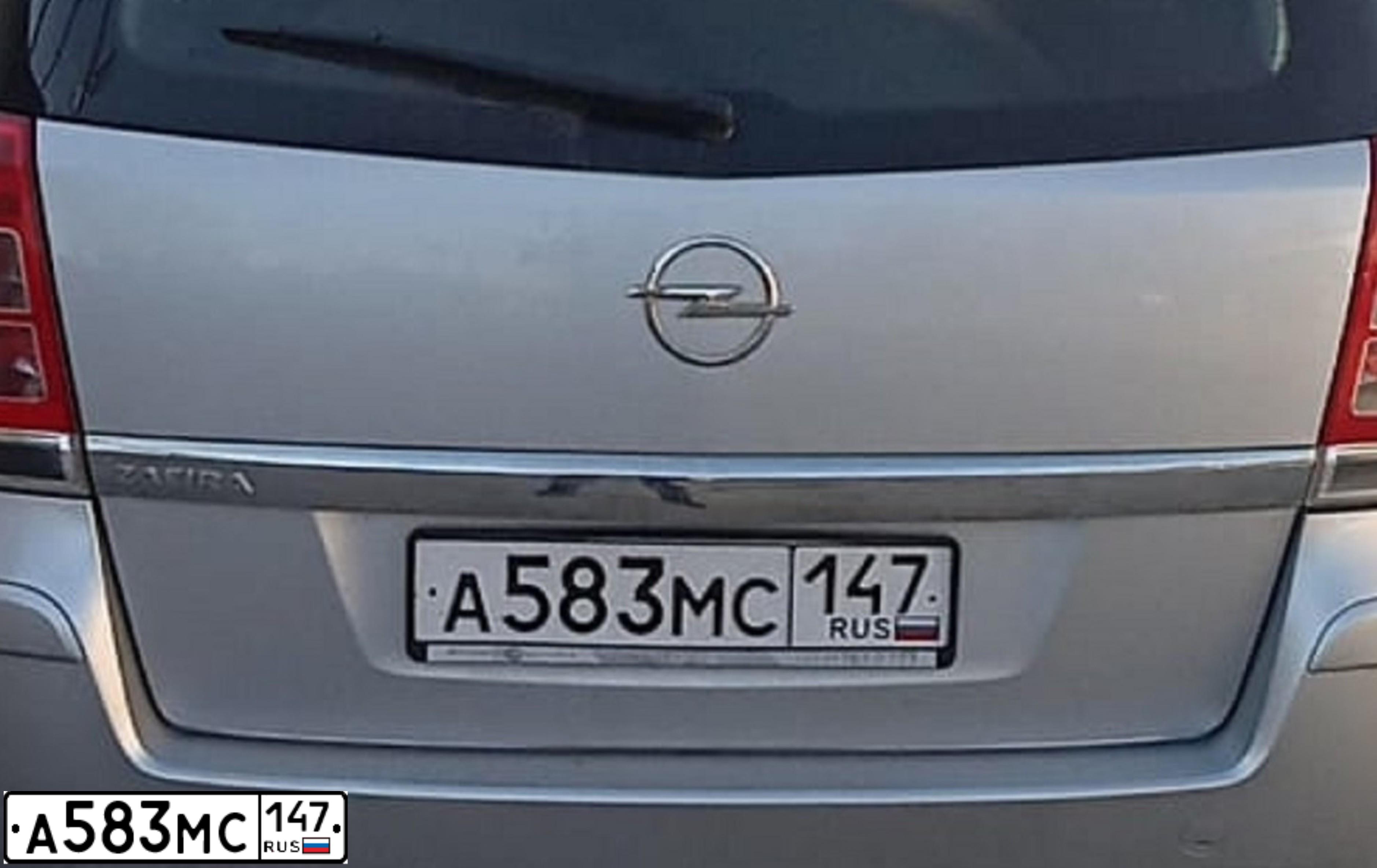 Фото автомобиля OPEL ZAFIRA, 2012 — госномер В323РУ60. Цвет: Серебристый