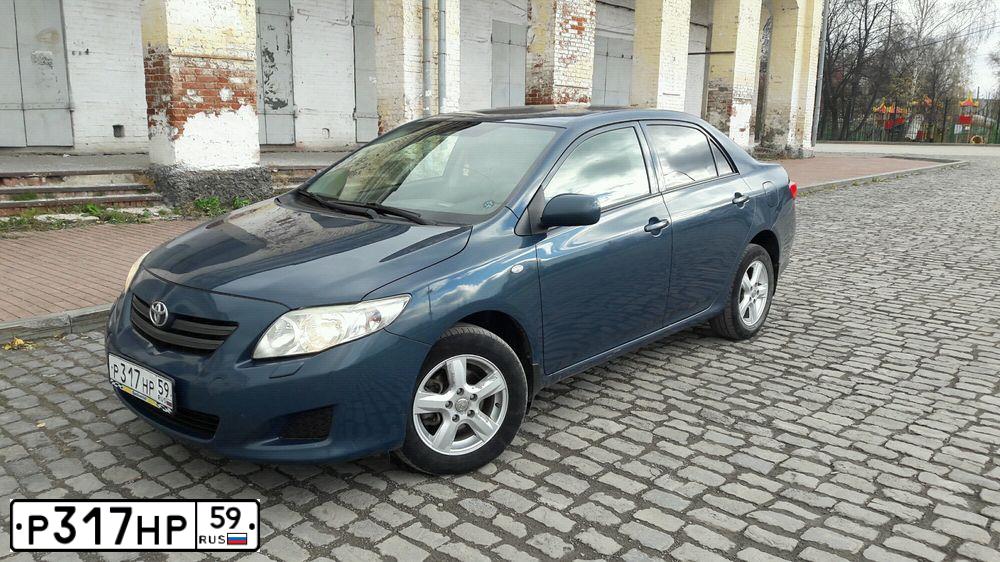 Фото автомобиля TOYOTA COROLLA, 2008 — госномер М121КХ159. Цвет: Темно-синий